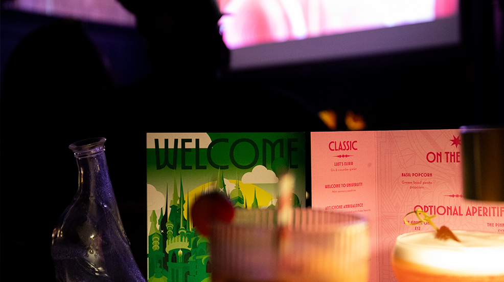 A close up of Taste Cinema menus corresponding to the Wicked Witch and the Good Witch for Wicked: Part One
